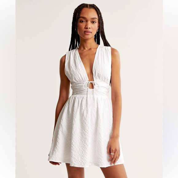 Abercrombie & Fitch Dresses & Skirts - Abercrombie & Fitch
Tie-Front Textured Mini Dress sz XS White